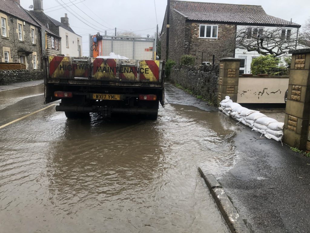 Heavy rain causing flood disruption with people rescued from cars The